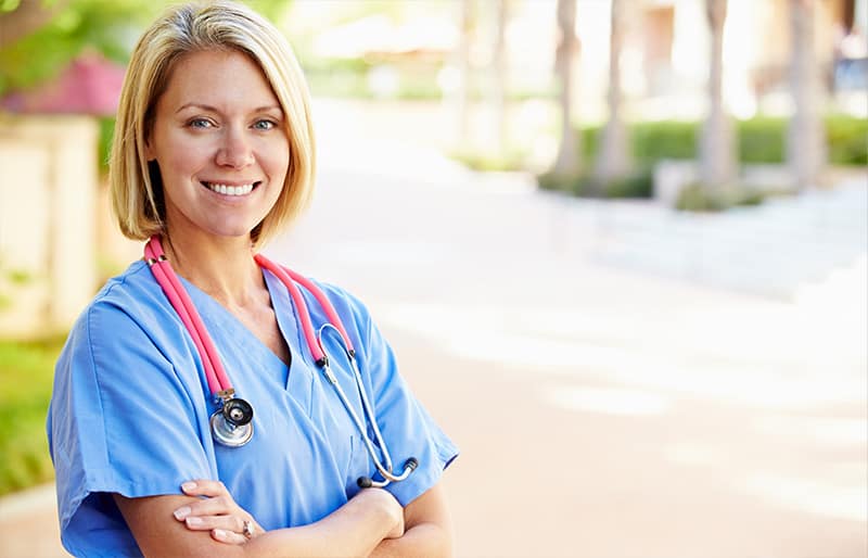 A nurse smiling